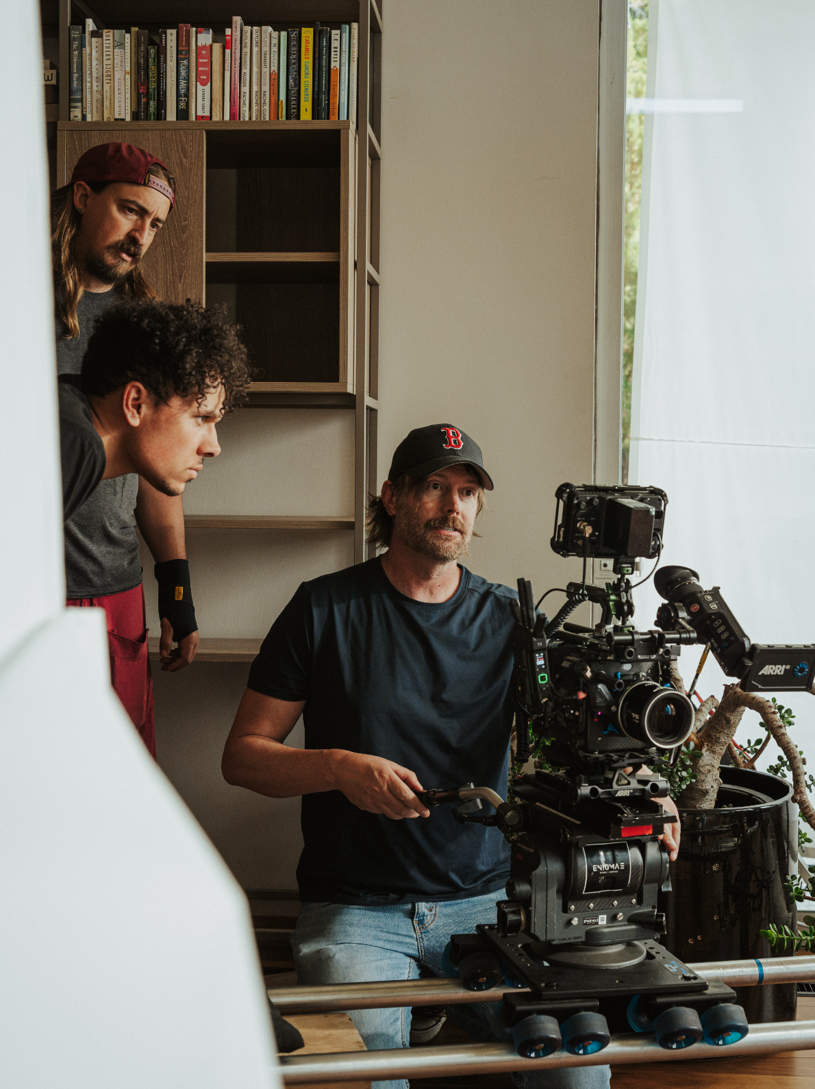 Capture Films crew working around an ARRI camera on set